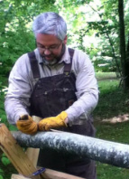 Artist Sawing A Log For Contemporary Basketry