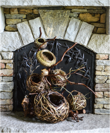 Contemporary rustic sculpture in hearth made by matt tommey from the river arts district in asheville, north carolina.