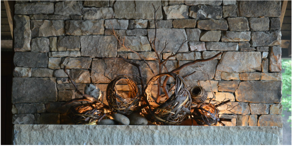 Grapevine rustic sculpture baskets by matt tommey for fireplace mantel.