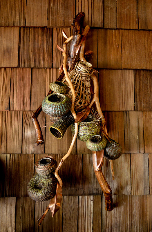 Cedar shake shingles with wall sculpture decor by Matt Tommey from the River Arts District of Asheville, North Carolina.