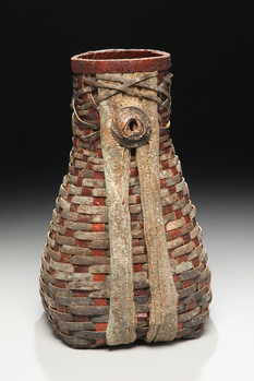 Red And Brown Fluted Basket As Example Of Rustic Sculptures