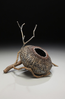 Basket In A Branch As Rustic Sculptures