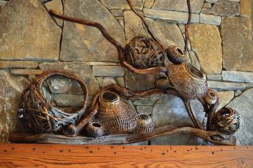 Baskets On A Branch As Fireplace Mantel Decorating Ideas