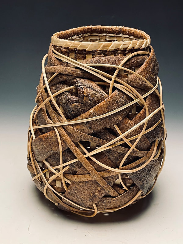 Random weave basket made by Matt Tommey created from mimosa and poplar bark, kudzu, honeysuckle vine and copper wire.