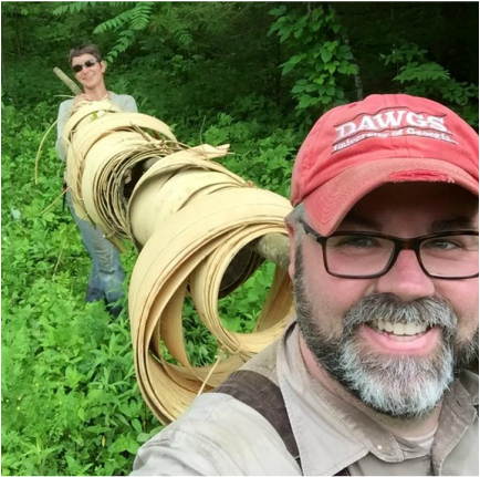 Matt Tommey of Asheville, North Carolina's River Arts District carries bark back to the studio to weave baskets using natural materials.