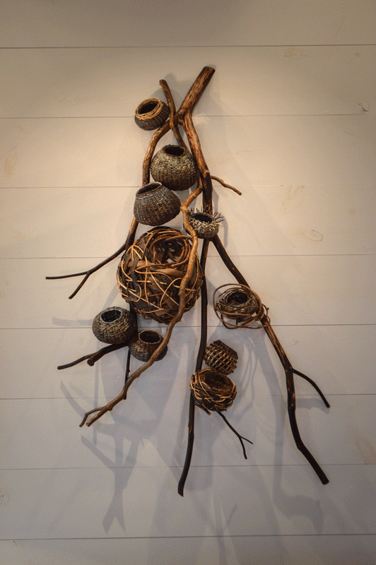 Sculptural wall hanging by matt tommey in a contemporary home. This piece is a rustic sculpture.