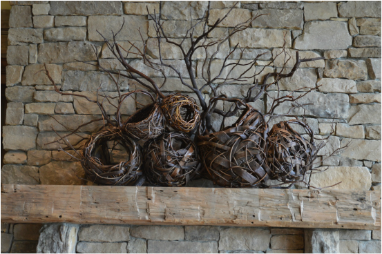 Contemporary fireplace mantel sculpture designed and created by Matt Tommey of Asheville, North Carolina's River Arts District. Matt makes these handwoven art baskets on commission for clients all over the country.