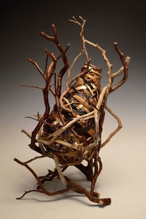 Basket With Branches That Serves As Elegant Rustic Decor