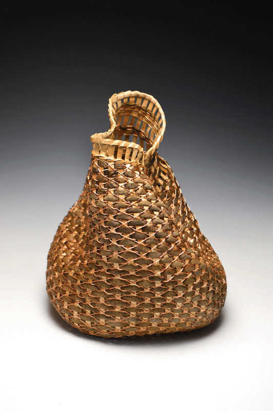 Basket woven with bark and copper wire made by Matt Tommey in the River Arts District of Asheville, North Carolina.